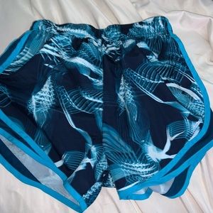 Blue patterned Nike shorts